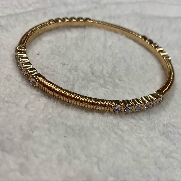 Graziano Gold Tone White Rhinestone Ribbed Bangle Bracelet - Picture 6 of 8